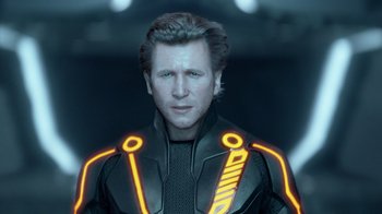 Movie still from “TRON: Legacy” (2010), directed by Joseph Kosinski – A man in a tron suit is looking at the camera; Close Up shot, Over the shoulder angle