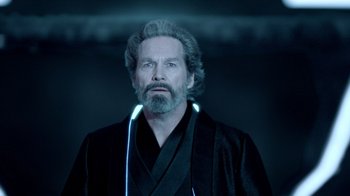 Movie still from “TRON: Legacy” (2010), directed by Joseph Kosinski – A man with a beard and a long white beard is wearing a black robe; Close Up shot, Low angle