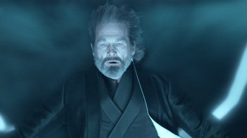 Movie still from “TRON: Legacy” (2010), directed by Joseph Kosinski – An older man with a beard is wearing a black robe; Medium shot, Low angle