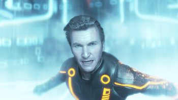 Movie still from “TRON: Legacy” (2010), directed by Joseph Kosinski – A person wearing a suit; Close Up shot, Low angle