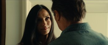 Movie still from “Taken 2” (2012), directed by Olivier Megaton – A man and a woman looking at one another in a mirror; Close Up shot, Over the shoulder angle