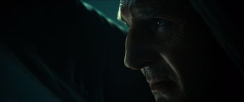 Movie still from “Taken 2” (2012), directed by Olivier Megaton – A man's face in the dark; Extreme Close Up shot, Over the shoulder angle