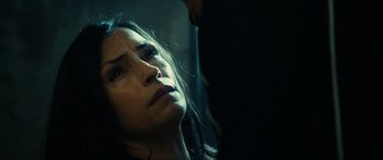 Movie still from “Taken 2” (2012), directed by Olivier Megaton – A person laying on the ground; Close Up shot, Over the shoulder angle