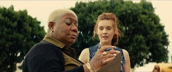 Two women looking at something on a tablet