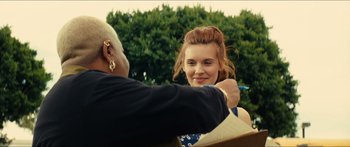 Movie still from “Taken 2” (2012), directed by Olivier Megaton – A young woman is getting her hair brushed by an older woman; Close Up shot, Over the shoulder angle