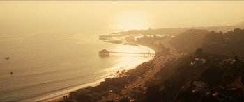 Movie still from “Taken 2” (2012), directed by Olivier Megaton – An aerial view of the ocean and a pier; Extreme Wide shot, High angle