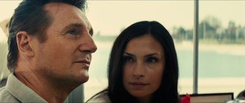 Movie still from “Taken 2” (2012), directed by Olivier Megaton – A man and a woman looking at one another; Close Up shot, Low angle