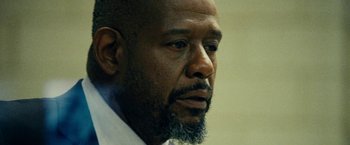 Movie still from “Taken 3” (2014), directed by Olivier Megaton – A person with a beard; Close Up shot, Low angle