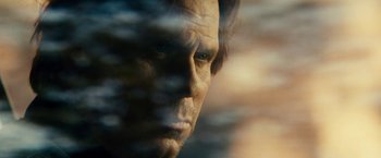 Movie still from “Taken 3” (2014), directed by Olivier Megaton – A man's face in a window; Extreme Close Up shot, Low angle