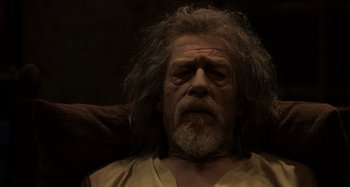 Movie still from “Only Lovers Left Alive” (2013), directed by Jim Jarmusch – An old man with long white hair and a beard; Close Up shot, Low angle