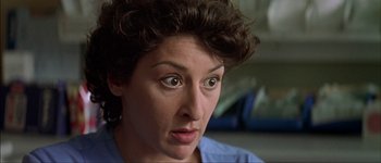 Movie still from “Talk to Her” (2002), directed by Pedro Almodóvar – A person looking at the camera; Close Up shot, Low angle