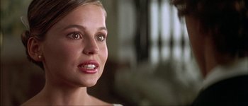 Movie still from “Talk to Her” (2002), directed by Pedro Almodóvar – A woman's face in a room; Close Up shot, Over the shoulder angle