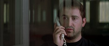 Movie still from “Talk to Her” (2002), directed by Pedro Almodóvar – A person talking on a cell phone; Close Up shot, Low angle