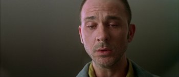 Movie still from “Talk to Her” (2002), directed by Pedro Almodóvar – A person with his eyes closed; Close Up shot, Low angle