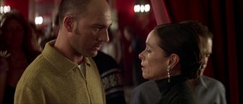 Movie still from “Talk to Her” (2002), directed by Pedro Almodóvar – A man and a woman looking at one another; Close Up shot, Over the shoulder angle