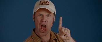 Movie still from “Talladega Nights: The Ballad of Ricky Bobby” (2006), directed by Adam McKay – A person wearing a hat; Close Up shot, Overhead angle