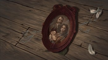 Movie still from “Tarzan” (1999), directed by Kevin Lima – An oval picture frame with a painting of jesus and a baby; Close Up shot, Overhead angle
