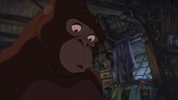 Movie still from “Tarzan” (1999), directed by Kevin Lima – A gorilla's face in a room; Close Up shot, Low angle