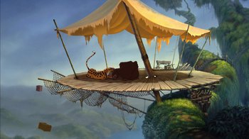 Movie still from “Tarzan” (1999), directed by Kevin Lima – An animal laying on top of a wooden platform under an awning; Wide shot, High angle