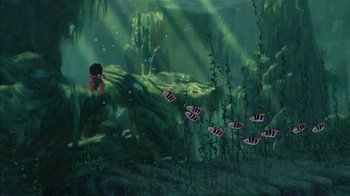 Movie still from “Tarzan” (1999), directed by Kevin Lima – An animated scene of a boy swimming in the water; Extreme Wide shot, High angle