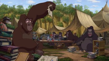 Movie still from “Tarzan” (1999), directed by Kevin Lima – A group of people sitting around a table; Wide shot, Low angle