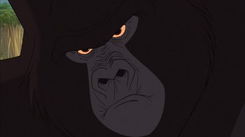 Movie still from “Tarzan” (1999), directed by Kevin Lima – An illustration of an angry gorilla with glowing eyes; Extreme Close Up shot, Low angle