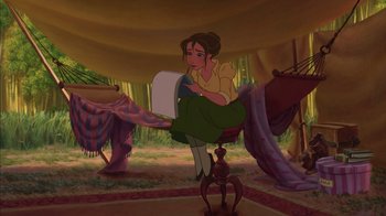 Movie still from “Tarzan” (1999), directed by Kevin Lima – A woman sitting on a chair in a living room; Wide shot, High angle