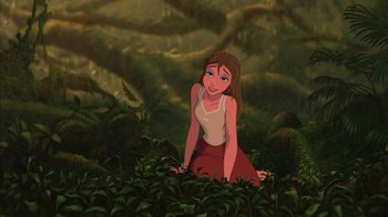 Movie still from “Tarzan” (1999), directed by Kevin Lima – A woman sitting on the ground surrounded by plants; Wide shot, Low angle