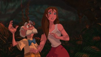 Movie still from “Tarzan” (1999), directed by Kevin Lima – An old man and a young woman in a forest; Medium shot, Low angle