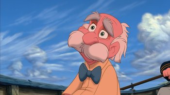 Movie still from “Tarzan” (1999), directed by Kevin Lima – An old man with a bow tie is looking at the camera; Close Up shot, Low angle