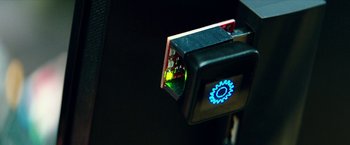 Movie still from “Teenage Mutant Ninja Turtles: Out of the Shadows” (2016), directed by Dave Green – A device that is being used; Extreme Close Up shot, High angle