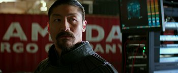 Movie still from “Teenage Mutant Ninja Turtles: Out of the Shadows” (2016), directed by Dave Green – A person wearing a black jacket; Close Up shot, Low angle