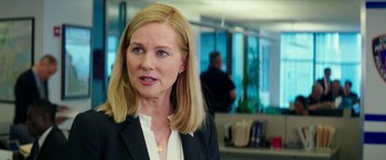 Movie still from “Teenage Mutant Ninja Turtles: Out of the Shadows” (2016), directed by Dave Green – A woman with blonde hair wearing a black jacket; Close Up shot, Over the shoulder angle