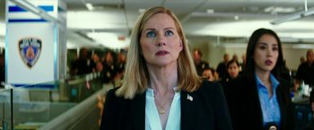 Movie still from “Teenage Mutant Ninja Turtles: Out of the Shadows” (2016), directed by Dave Green – A person wearing a suit and tie; Close Up shot, Low angle