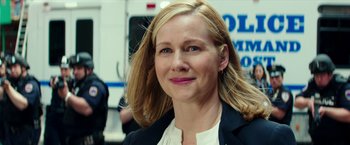 Movie still from “Teenage Mutant Ninja Turtles: Out of the Shadows” (2016), directed by Dave Green – A person wearing a suit; Close Up shot, Over the shoulder angle