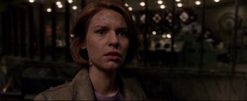 Movie still from “Terminator 3: Rise of the Machines” (2003), directed by Jonathan Mostow – A person wearing a jacket; Close Up shot, Low angle