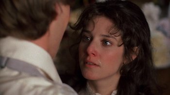 Movie still from “Terms of Endearment” (1983), directed by James L. Brooks – A person looking at the camera; Close Up shot, Over the shoulder angle