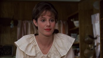 Movie still from “Terms of Endearment” (1983), directed by James L. Brooks – A person wearing a white shirt; Close Up shot, Over the shoulder angle