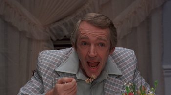 Movie still from “Terms of Endearment” (1983), directed by James L. Brooks – A person eating food from a spoon; Close Up shot, Low angle
