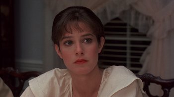 Movie still from “Terms of Endearment” (1983), directed by James L. Brooks – A person wearing a white shirt; Close Up shot, Low angle