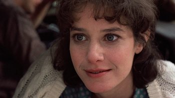 Movie still from “Terms of Endearment” (1983), directed by James L. Brooks – A woman's face with blue eyes; Close Up shot, Over the shoulder angle