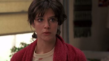 Movie still from “Terms of Endearment” (1983), directed by James L. Brooks – A person wearing a sweater; Close Up shot, Low angle