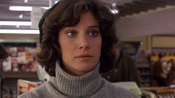 Movie still from “Terms of Endearment” (1983), directed by James L. Brooks – A person wearing a sweater; Close Up shot, Low angle