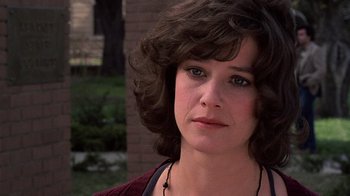 Movie still from “Terms of Endearment” (1983), directed by James L. Brooks – A person wearing a sweater; Close Up shot, Over the shoulder angle
