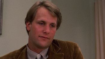 Movie still from “Terms of Endearment” (1983), directed by James L. Brooks – A person wearing a suit and tie; Close Up shot, Low angle