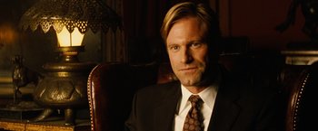 Movie still from “Thank You for Smoking” (2005), directed by Jason Reitman – A person wearing a suit and tie; Close Up shot, Over the shoulder angle