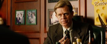 Movie still from “Thank You for Smoking” (2005), directed by Jason Reitman – A person wearing a suit and tie; Close Up shot, Over the shoulder angle