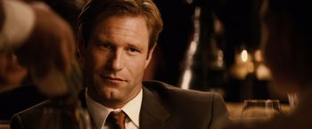 Movie still from “Thank You for Smoking” (2005), directed by Jason Reitman – A person wearing a suit and tie; Close Up shot, Over the shoulder angle