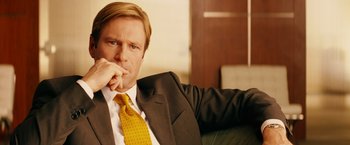 Movie still from “Thank You for Smoking” (2005), directed by Jason Reitman – A person wearing a suit and tie; Close Up shot, Over the shoulder angle