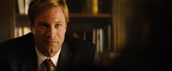 Movie still from “Thank You for Smoking” (2005), directed by Jason Reitman – A person wearing a suit and tie; Close Up shot, Over the shoulder angle